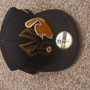 Black and yellow new era Yankees hat